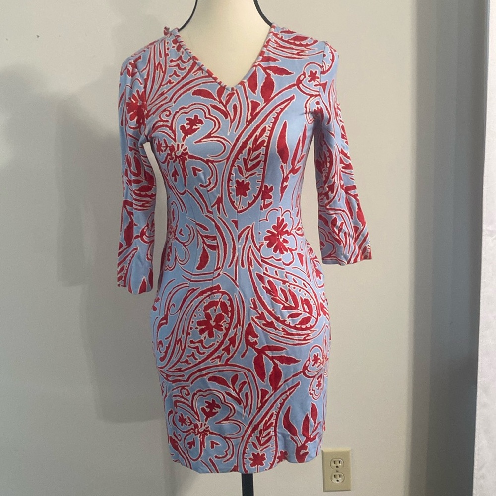 Beautiful dress the colors blue and red. does not have a ticket